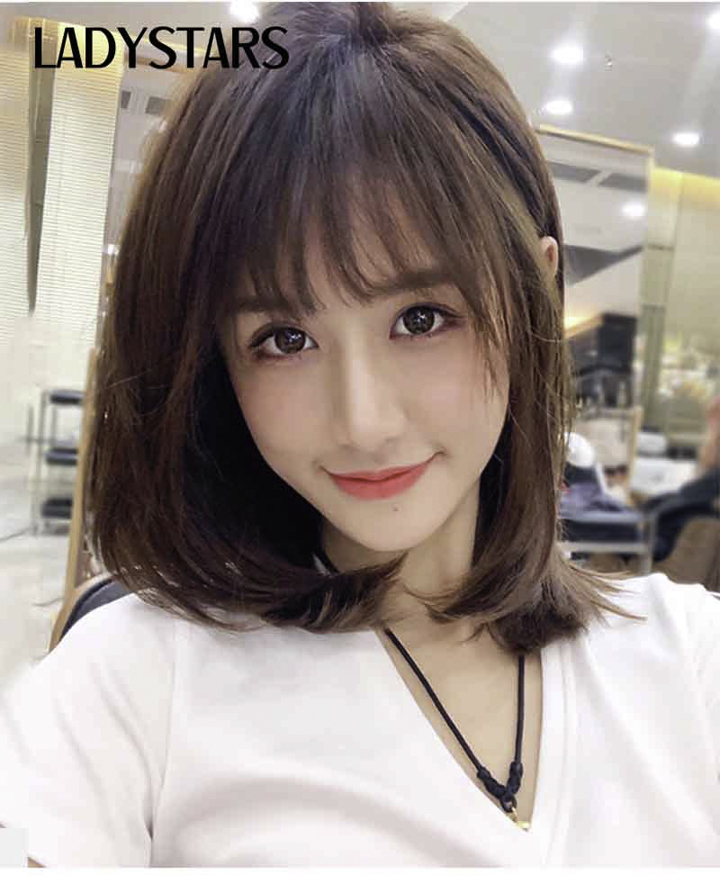 Tóc uốn cụp ngang kết hợp với mái thưa